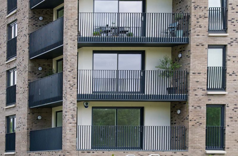 Modern high-rise flats with balconies.