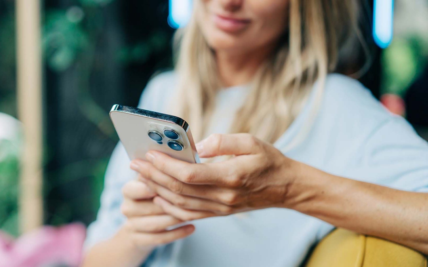 Woman using smartphone.