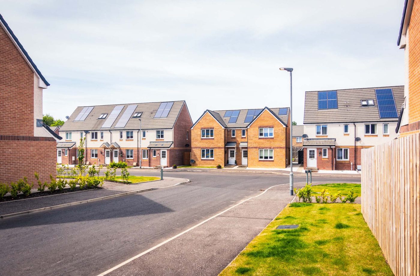 New homes with solar panels on roofs.