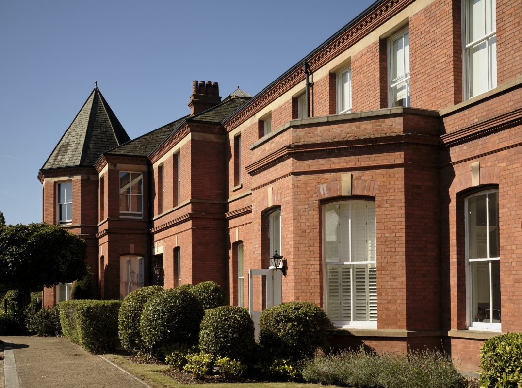 Brick building in Scotland; part of a larger structure.