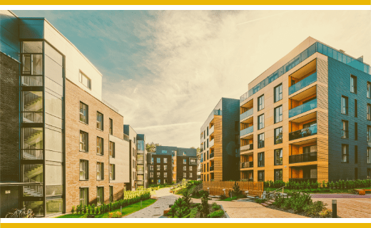 Apartment buildings and landscaped pathway.