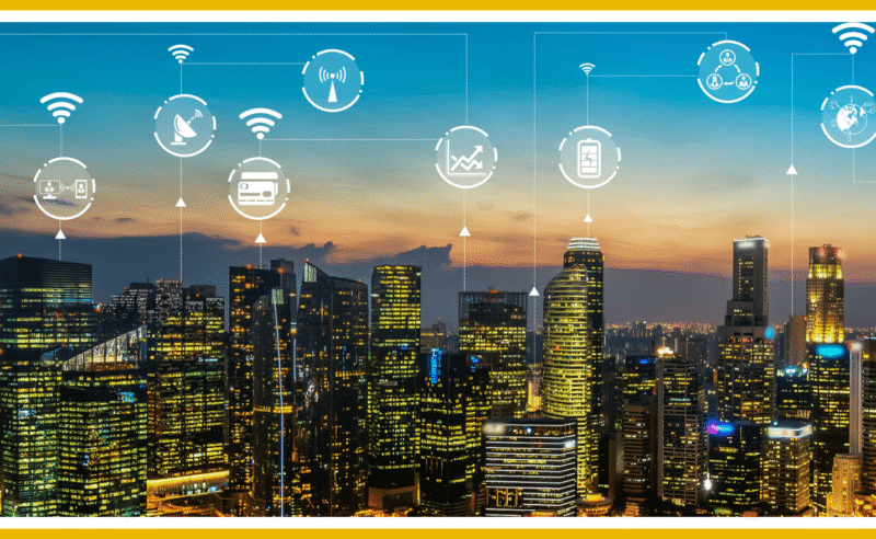 Night cityscape with overlaid smart building technology icons.