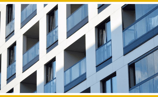 Modern apartment building exterior with balconies.