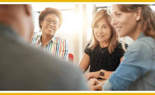 Group of people in discussion.